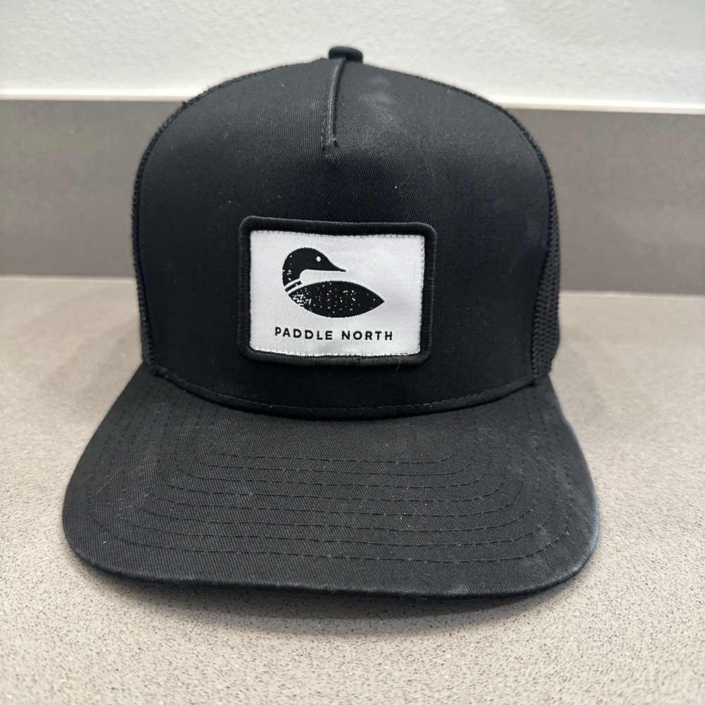 Paddle North Black Trucker Hat with Loon Patch